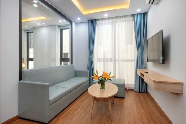 Apartment, 2 Bedrooms | Living area | 24-inch flat-screen TV with cable channels - Hummer Hotel & Apartment Danang Beach  (Da Nang)