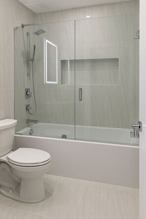 Shower, hair dryer, towels, soap