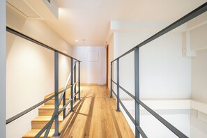 Business-Maisonette, Mehrere Betten, Nichtraucher, Stadtblick | Wohnbereich