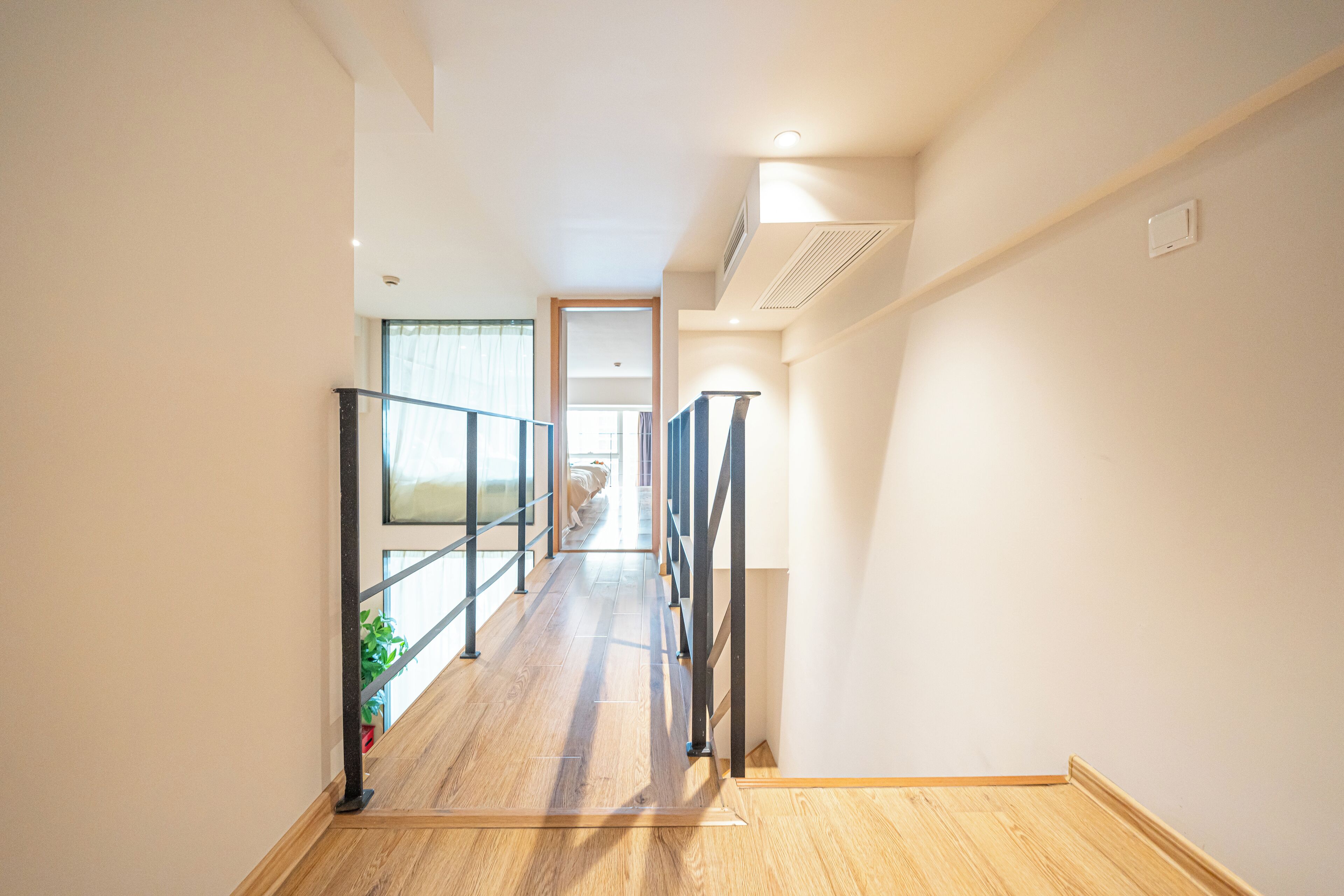 Dúplex empresarial, varias camas, para no fumadores, vista a la ciudad | Área de sala de estar