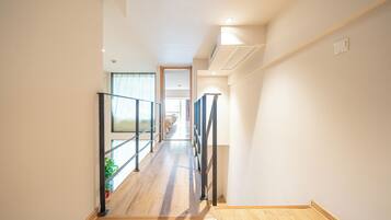 Dúplex empresarial, varias camas, para no fumadores, vista a la ciudad | Área de sala de estar