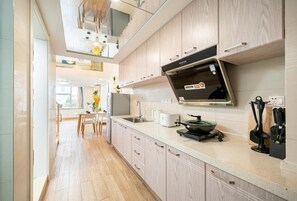 Fridge, stovetop, cookware/dishes/utensils