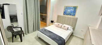 Double room with balcony 300 mts from the river boardwalk