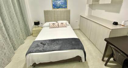 Double room with balcony 300 mts from the river boardwalk