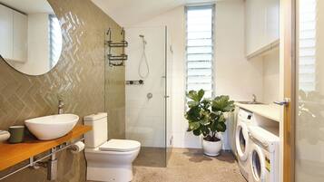 Shower, hair dryer, towels, soap