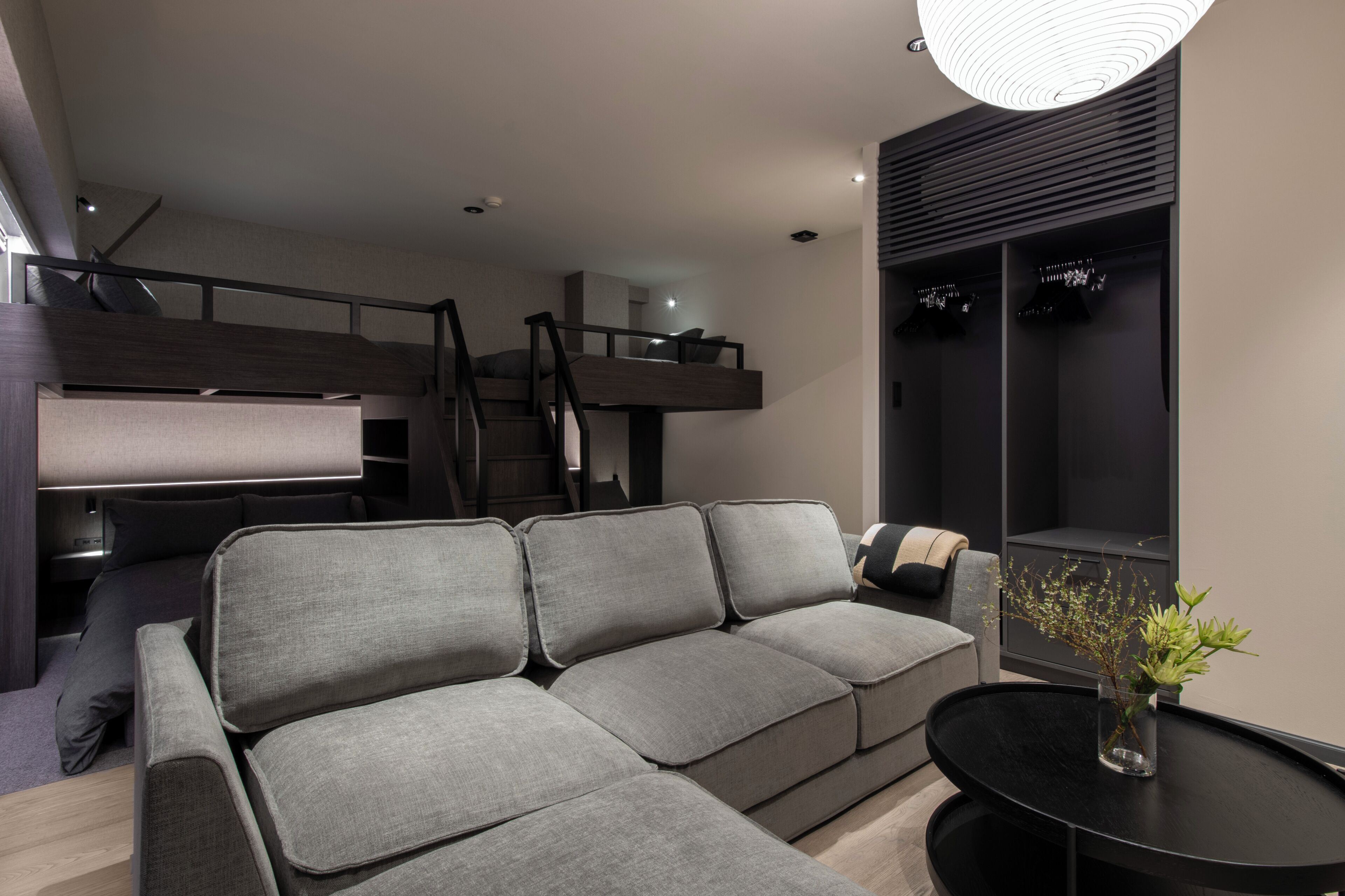 Family Quadruple Room | Living area | 62-inch Smart TV with digital channels