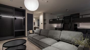 Family Quadruple Room, City View | Living area | 62-inch Smart TV with digital channels