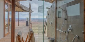 Shower, bathrobes, towels, soap