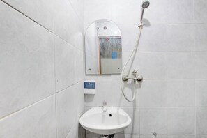 Shower, towels, soap, shampoo