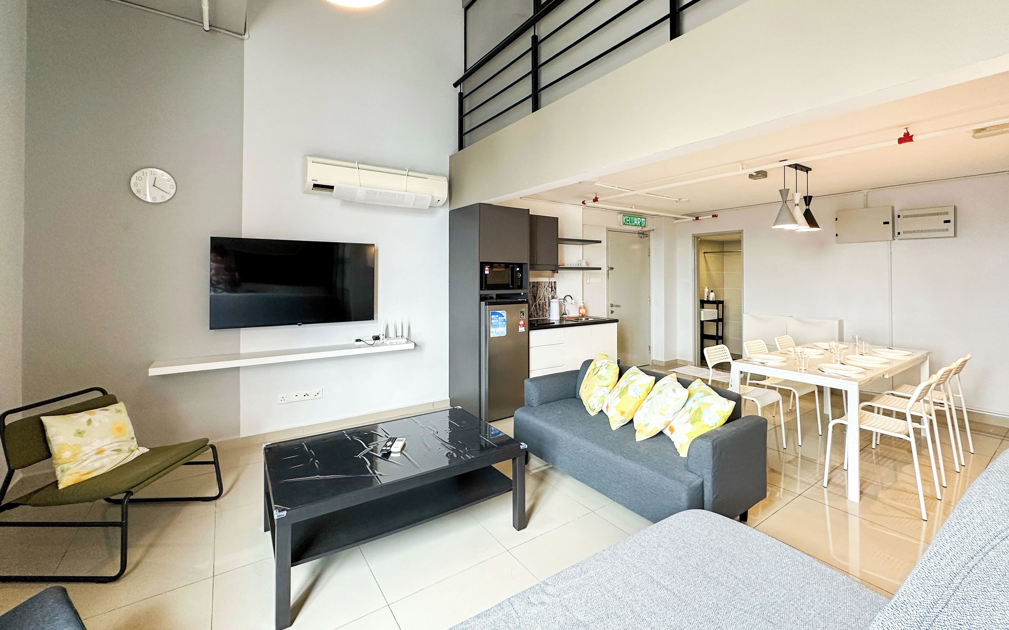 Deluxe Duplex, City View | Living area | 45-inch Smart TV with digital channels