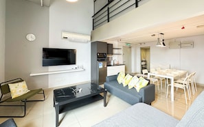 Deluxe Duplex, City View | Living area | 45-inch Smart TV with digital channels - Pinnacle Kelana Jaya by Airhost  (Petaling Jaya)