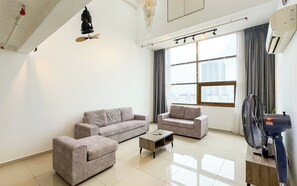 Loft, vue ville | Coin séjour