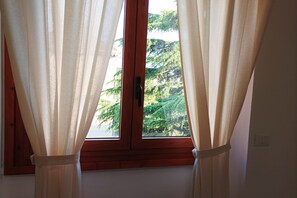Chambre classique double ou avec lits jumeaux | Vue de la chambre