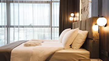 Superior Room, City View | 1 bedroom, in-room safe, desk, blackout drapes