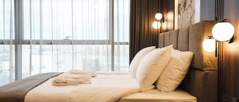 Superior Room, City View | 1 bedroom, in-room safe, desk, blackout drapes