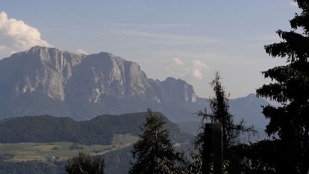 A mountain landscape with a clear sky.
