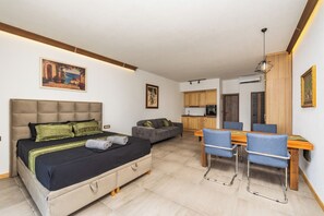 Comfort Suite, Sea View, Beachside | 1 bedroom, soundproofing, free WiFi