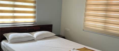 2 habitaciones, tabla de planchar con plancha, wifi y ropa de cama