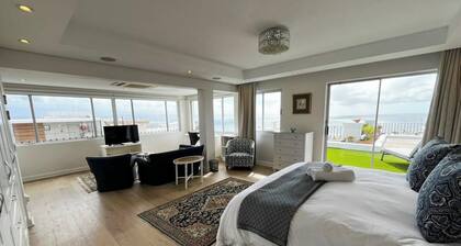 Exquisite Plett Penthouse: Landmark Luxury & Panoramic Coastal Views