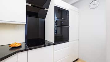 Comfort Apartment, Balcony, City View | Private kitchen | Full-sized fridge, microwave, oven, stovetop