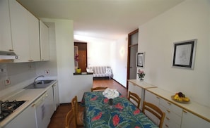 Apartment, 3 Bedrooms, Balcony, Garden View | Dining room - Comfortable Flat With Balcony for Nine Guests in Lignano Sabbiadoro (Lignano Sabbiadoro)