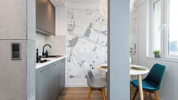 Comfort Apartment, Balcony, City View | Private kitchen | Mini-fridge, stovetop, dishwasher, coffee/tea maker