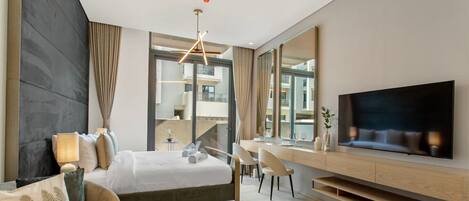 1 bedroom, desk, iron/ironing board, travel crib