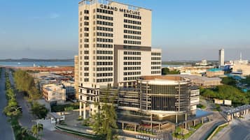 Outdoor pool, open 6:00 AM to 6:00 PM, pool loungers