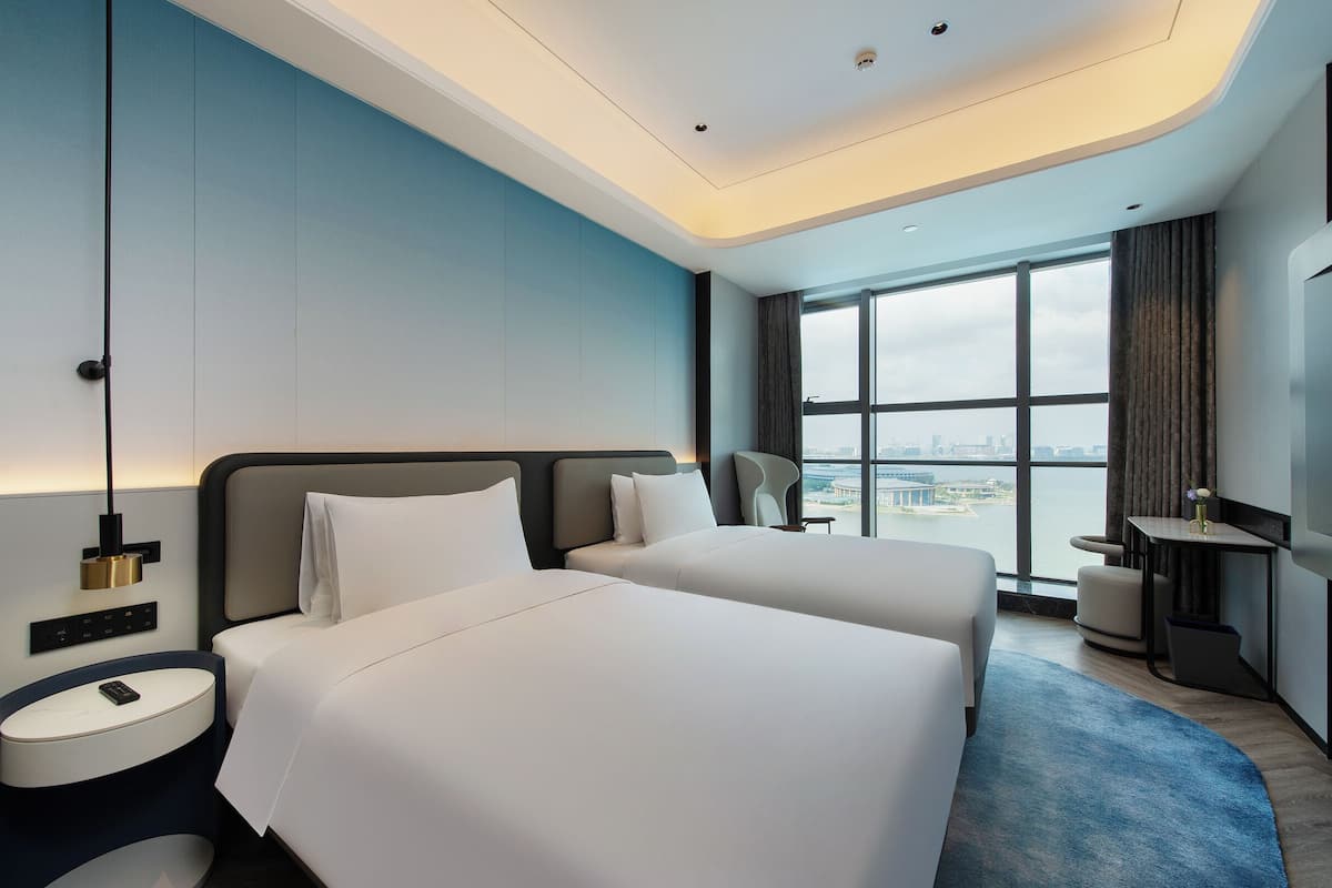 Deluxe Room, Multiple Beds, Lake View | 1 bedroom, down duvets, minibar, in-room safe