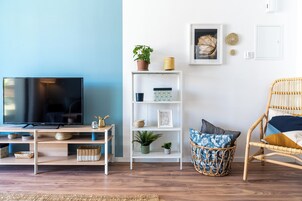 Apartment, 1 Double Bed with Sofa bed, Balcony, City View | Living area | 42-inch Smart TV with digital channels, streaming services