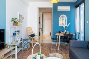 Apartment, 1 Double Bed with Sofa bed, Balcony, City View | Living area | 42-inch Smart TV with digital channels, streaming services - Hue 1-Bedroom Apartment in Larnaca (Larnaca)