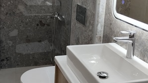 Hair dryer, towels, soap, toilet paper
