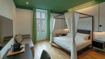 Deluxe Room, Private Bathroom, City View | In-room safe, desk, blackout curtains, iron/ironing board