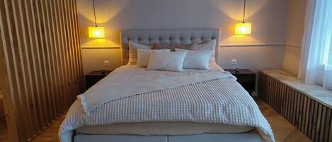 1 slaapkamer, een strijkplank/strijkijzer, reisbedje, gratis wifi