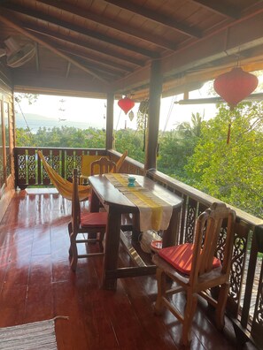 Outdoor dining - Our Jungle Rock House. A unique 2 bedroom pool villa built amongst granite rocks (Koh Phangan)