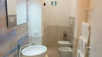 Asciugacapelli, asciugamani, sapone