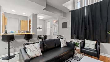 Deluxe House | Living area | TV