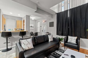 Deluxe House | Living area | TV