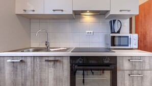 Een magnetron, een oven