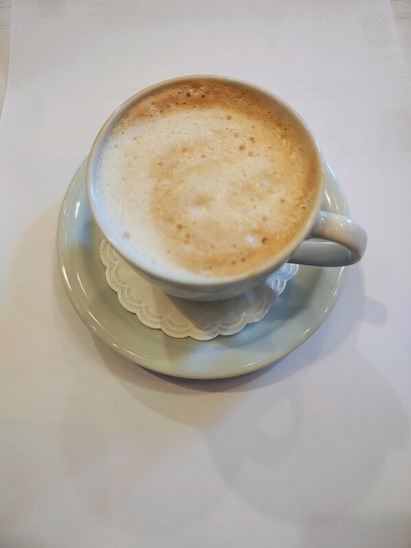 A cup of coffee on a saucer. - Konak Vukašinović (Belgrade)