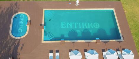 2 outdoor pools, pool umbrellas, sun loungers