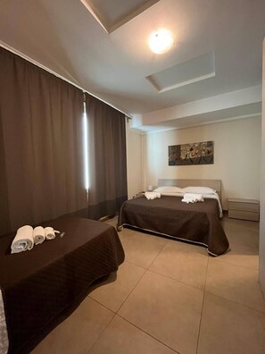 1 chambre, fer et planche Ă repasser, Wi-Fi, draps fournis