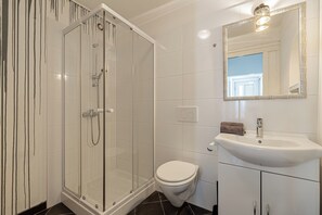 Shower, towels, soap, shampoo