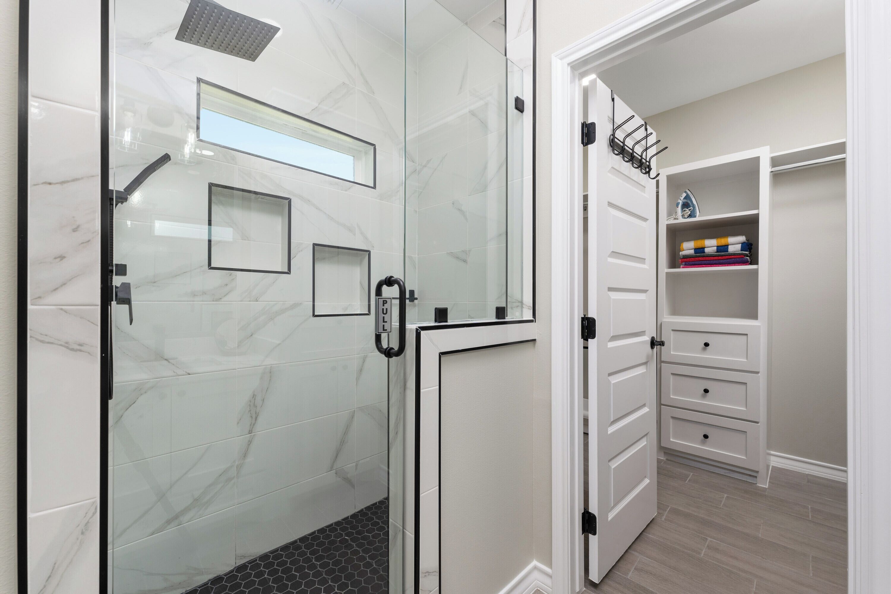 Shower, hair dryer, towels, soap
