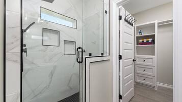 Shower, hair dryer, towels, soap