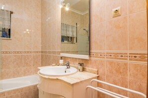 Bidet, towels, toilet paper