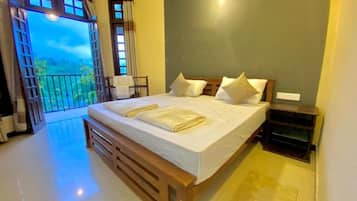 Deluxe Double Room, Garden View | Desk, laptop workspace, iron/ironing board, free WiFi
