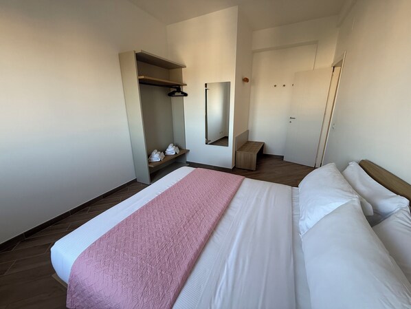 Appartement, balcon, vue ville | 2 chambres, fer et planche à repasser, Wi-Fi gratuit