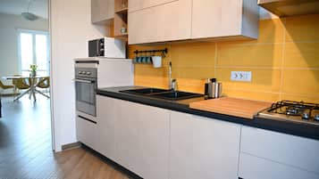 Appartamento, balcone, vista città | Cucina privata