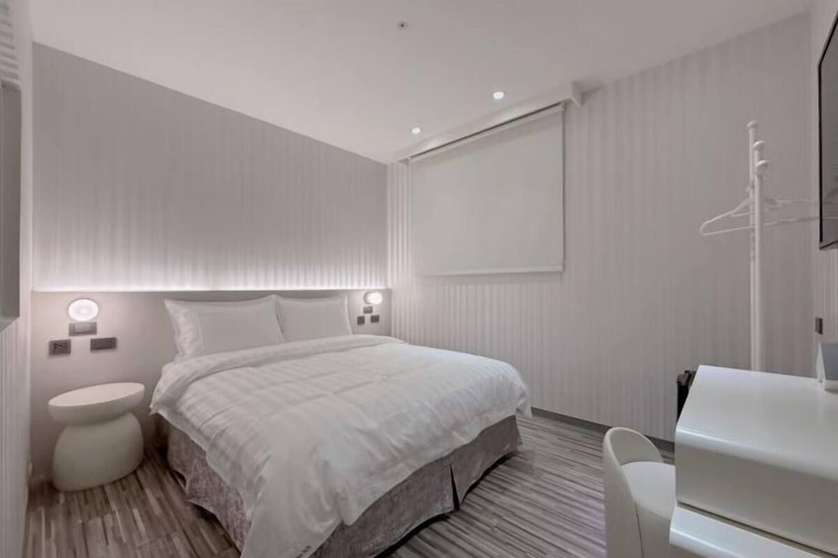 Premium bedding, down duvets, memory-foam beds, desk